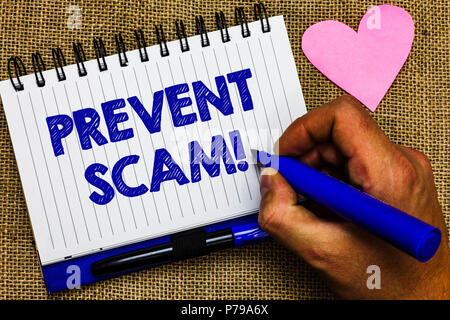 Schreiben Hinweis anzeigen verhindern Scam Motivationale nennen. Business foto Präsentation Verbraucherschutz betrügerische Transaktionen Notepad pen Papiere Ideen. Stockfoto