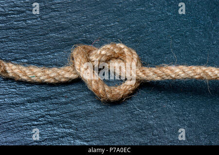 Knoten in Jute Seil Stockfoto