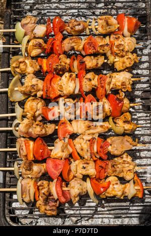 Gegrilltes Fleisch und Tomaten Stockfoto