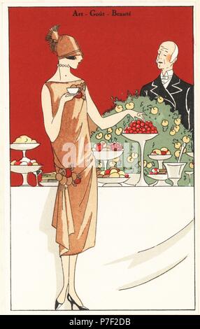 Frau an einem Frühstücksbuffet Tea Party tragen einen Nachmittag Kleid in Krepp bestickt mit Blumen Kameen. Papierkörbe pochoir (Schablone) Lithographie von der Französischen luxus Mode Magazin Kunst, Gicht, Beauté, 1925. Stockfoto