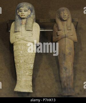 Ägypten. Ushebti. Grabbeigaben Figurinen aus Kalkstein und Holz. 14. Jahrhundert V.Chr. Neuen Reiches. Die Eremitage. Sankt Petersburg. Russland. Stockfoto