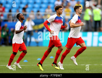 England's Raheem Sterling (von links nach rechts), Englands Dele Alli (Mitte) und der Engländer Gary Cahill (rechts) vor der Fußball-WM, Viertel Finale von Samara Stadion. Stockfoto