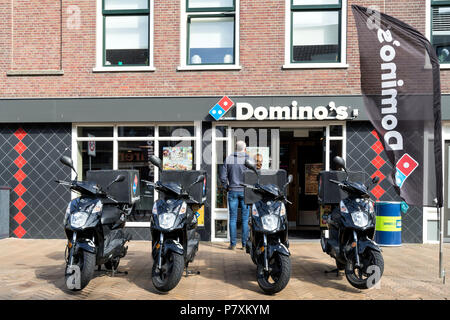 Restaurant Domino in Katwijk aan Zee, Niederlande. Domino's ist eine US-amerikanische Pizza Restaurant kette Gegründet im Jahre 1960. Stockfoto