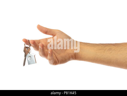 Männliche hand mit einem Haus auf weißem Hintergrund, Freistellungspfad Stockfoto