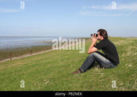 Vogelaar in actie; Vogelbeobachter in Aktion Stockfoto