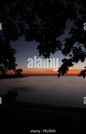 In de Avond Oderdelta; Nightfall am Oderdelta Stockfoto