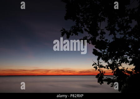 In de Avond Oderdelta; Nightfall am Oderdelta Stockfoto