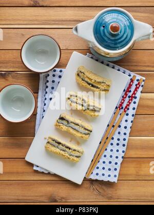 Koreanisches Essen schwarzer Sesam Pulver Soja Klebreis Kuchen Stockfoto