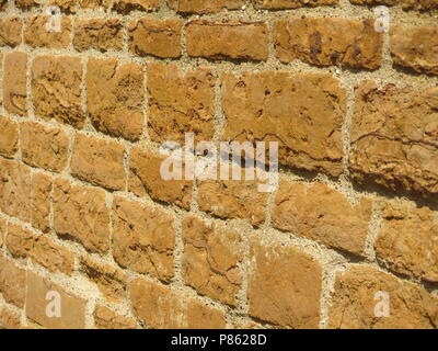 Eine Nahaufnahme der Quadern blockwork im Earls Barton Kirche, ein schönes Beispiel für eine Sächsische Kirche, wo Bau im 10. Jahrhundert begann. Stockfoto