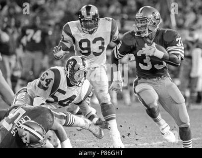 Dezember 19, 1986 - San Francisco, Kalifornien, USA - San Francisco 49ers vs Los Angeles Rams an Candlestick Park Freitag, 19 Dezember, 1986. 49ers Schlagen Rams 24-14. San Francisco 49ers Zurück Roger Craig (Credit Bild: © Al Golub über ZUMA Draht) Stockfoto