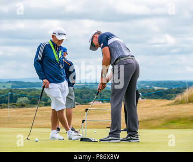 Gullane, Großbritannien. 10. Juli 2018. Aberdeen Standard Investitionen Scottish Open Golf Championship letzte Vorbereitungen, Gullane, East Lothian, Schottland, Vereinigtes Königreich, 10. Juli 2018. Die letzte Phase der Vorbereitungen für den 5. Europäischen Tour Rolex Serie im Gullane Golfkurs in der Vorbereitung für den Start der Open Championship vom 12. bis 15. Juli. Professionelle Golfspieler Üben auf dem Putting Green Stockfoto