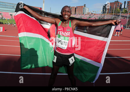 Tampere, Finnland. 10. Juli 2018. Rhonex Kipruto von Kenia feiert nach den Herren 10.000 m an die 2018 IAAF World U20 Meisterschaften in Tampere, Finnland, am 10. Juli 2018. Credit: Matti Matikainen/Xinhua/Alamy leben Nachrichten Stockfoto