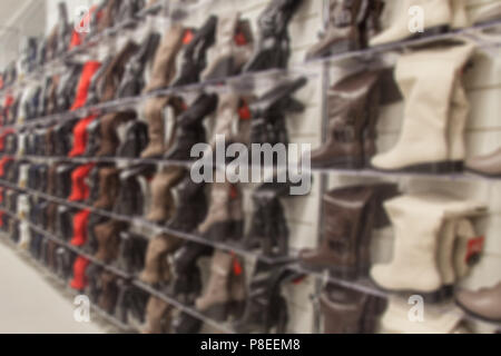 Blur, Vitrine mit Schuhen, store Hintergrund Stockfoto