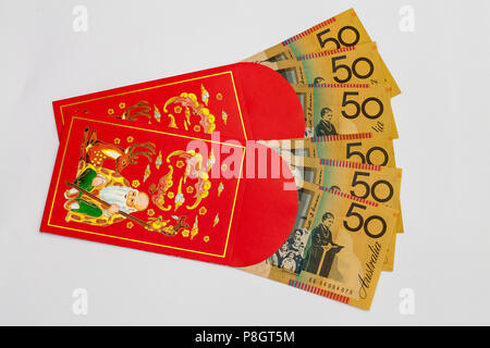 Chinesische Rote Tasche mit australischen Geld innerhalb Stockfoto