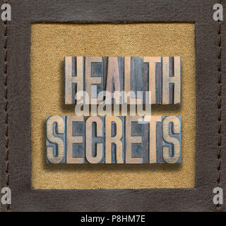 Gesundheit Geheimnisse von Vintage Holz- Hochdruck innen genäht Leder Rahmen montiert Stockfoto