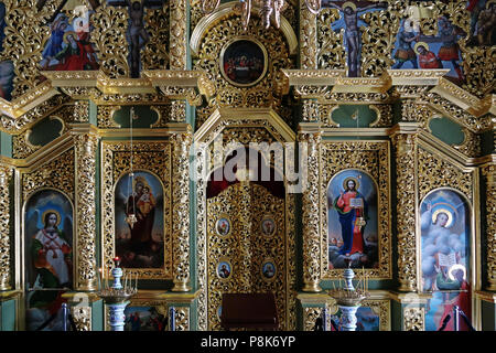 Die ikonostase geschmückt mit Symbole und religiöse Gemälde im Inneren der rekonstruierten Kathedrale von 1352 die wichtigste Kirche des Kiewer Pechersk Lavra auch als das Kiewer Höhlenkloster, einem historischen orthodoxen christlichen Kloster und UNESCO-Weltkulturerbe in Kiew die Hauptstadt der Ukraine bekannt Stockfoto