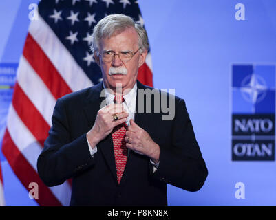 Brüssel, Belgien. 12. Juli 2018. U.S. National Security Advisor John Bolton besucht eine Pressekonferenz von US-Präsident Donald Trump am zweiten Tag der NATO-Gipfel in Brüssel, Belgien, am 12. Juli 2018. Credit: Ihr Pingfan/Xinhua/Alamy leben Nachrichten Stockfoto