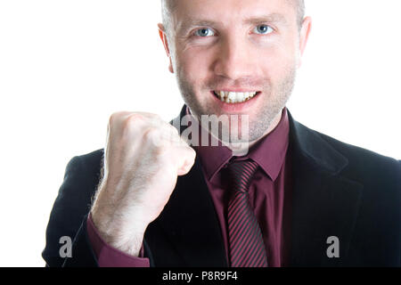 Meister business Mann stand mit Fäuste geballt in den Sieg. Stockfoto