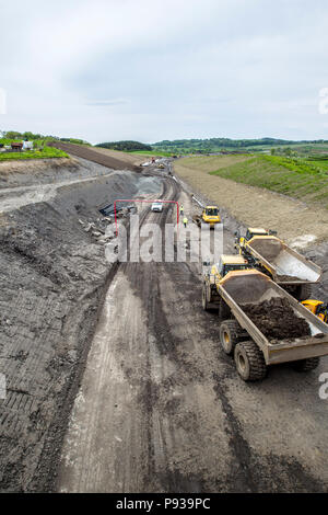 Schwere Werk bereitet Boden für neue Straße Stockfoto