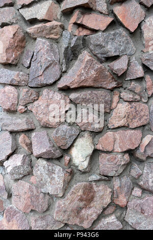 Schutt grau und braun Steinmauer, Schutt arbeiten. Stockfoto