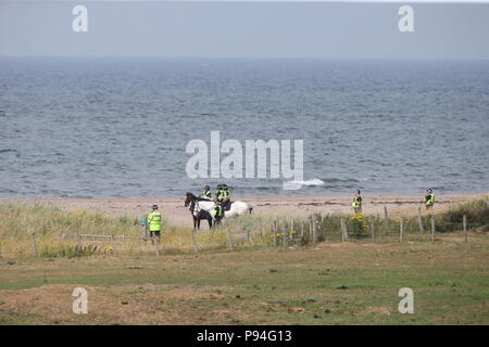 Polizei Spalier der Strand in der Nähe des Trump Turnberry Resort in South Ayrshire, wo US-Präsident Donald Trump und First Lady Melania Trump das Wochenende verbringen an der Trumpf Turnberry Resort in South Ayrshire. Stockfoto