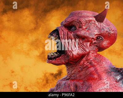 Kopf Porträt eines bedeuten, die dämonische, roter Teufel mit Hörnern. Sein Mund steht offen und voller schleimiger Speichel, 3D-Rendering. Er wird von Feuer umgeben. Stockfoto