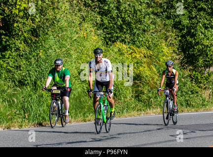 Sumner Washington, USA - 14. Juli 2018: Mit dem Fahrrad von Seattle nach Portland (STP) Radfahrer fahren Sie West Valley Highway kurz vor Sumner Stockfoto