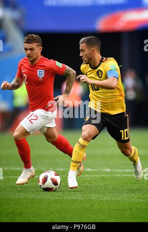 Juli 14th, 2018, St. Petersburg, Russland. Kieran Trippier von England und Eden Hazard von Belgien in Aktion während der FIFA WM 2018 Russland Übereinstimmung zwischen England und Belgien am Stadion St. Petersburg, Russland. Shoja Lak/Alamy leben Nachrichten Stockfoto