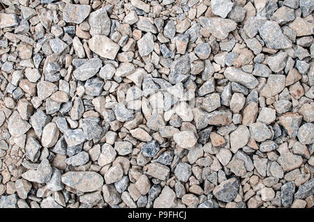 Zerkleinert grau und beige Kies für Pflaster Stiftung closeup als Hintergrund Stockfoto