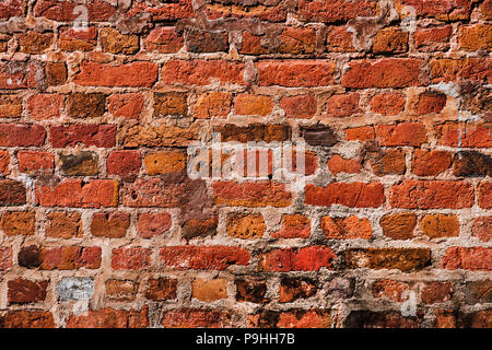 Old Red Brick Wall, grunge Hintergrund. Brick Wall von orange Farbe Stockfoto