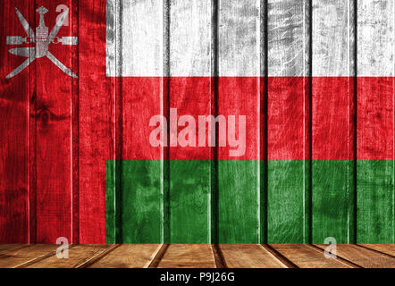 Holz- Hintergrund mit einer Flagge des Oman. Es ist ein Ort für Ihren Text im Foto. Stockfoto