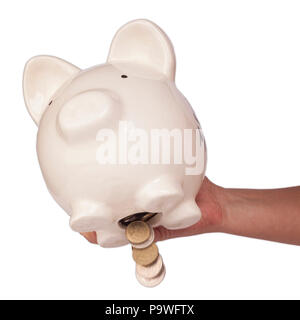 Das Geld aus dem sparschwein Studio shoot Nehmen Stockfoto