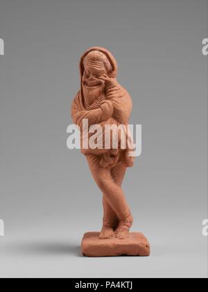 Terrakotta Statuette der Schauspieler. Kultur: Griechisch, Dachboden. Abmessungen: H.4 1/4 in. (10,8 cm). Datum: Ende 5./Anfang des 4. Jh. v. Chr.. 14 Diese Zahlen sind zusammen in einer Beerdigung in Attika gefunden worden zu sein. Sie gehören zu den frühesten bekannten Statuetten von Akteuren und sind hervorragend ausgeführt und konserviert. Ursprünglich wurden sie bunt bemalt. Sie dokumentieren den Anfang von standardisierten Figuren und Masken, die die Popularität nicht einer bestimmten Figur, aber der Typen -- der alte Mann, der Slave, die Kurtisane, etc. -, die immer wieder in verschiedenen spielt erschienen. In der Mitte des vierten Jahrhunderts Stockfoto