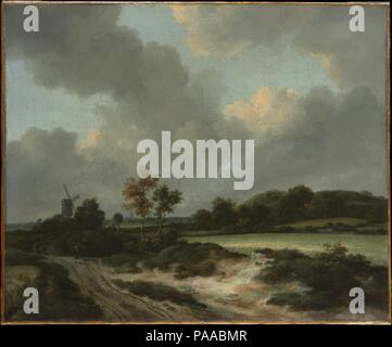 Saaten. Artist: Jacob van Ruisdael (Niederländisch, Haarlem, Amsterdam 1628/29-1682). Abmessungen: 18 1/2 x 22 1/2 in. (47 x 57,2 cm). Datum: mittleren oder späten 1660s. Diese Leinwand von Mitte bis Ende der 1660s zeigt eine Straße durch Saat und in der Ferne ein Dorf Kirche. Zeitgenössische Zuschauer würden sofort verstanden haben die Beziehungen zwischen den Regenwolken, die Felder, und die Mühle fein detaillierte Gemälde des englischen Malers Sir Joshua Reynolds zwischen 1756 und seinem Tod im Jahr 1792 gehörte. Museum: Metropolitan Museum of Art, New York, USA. Stockfoto