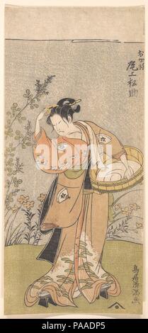 Der Schauspieler Onoya Matsusuke, in einem weiblichen Gewand der O-Kane, passt sie den Kamm in die Haare. Artist: Torii Kiyomitsu (Japanisch, 1735-1785). Kultur: Japan. Abmessungen: 12 1/8 x 5 1/2 in. (30,8 x 14 cm). Datum: 1735-1785. Museum: Metropolitan Museum of Art, New York, USA. Stockfoto