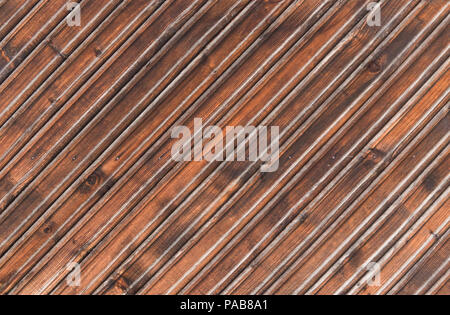 Alte braune hölzerne Bretter Hintergrund Textur, alte peeling Holzzaun für Designer. Stockfoto