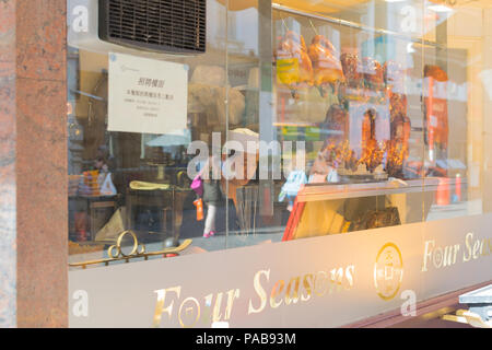 Koch bei der Arbeit, ein chinesisches Restaurant, London Stockfoto