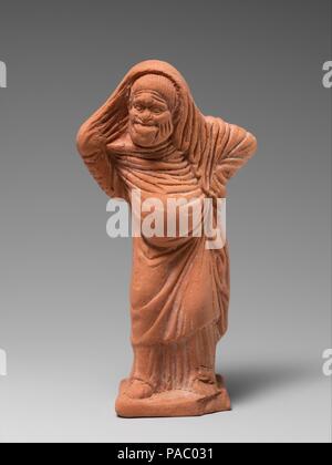 Terrakotta Statuette der Schauspieler. Kultur: Griechisch, Dachboden. Abmessungen: H.4 1/8 in. (10,5 cm). Datum: Ende 5./Anfang des 4. Jh. v. Chr.. 14 Diese Zahlen sind zusammen in einer Beerdigung in Attika gefunden worden zu sein. Sie gehören zu den frühesten bekannten Statuetten von Akteuren und sind hervorragend ausgeführt und konserviert. Ursprünglich wurden sie bunt bemalt. Sie dokumentieren den Anfang von standardisierten Figuren und Masken, die die Popularität nicht einer bestimmten Figur, aber der Typen -- der alte Mann, der Slave, die Kurtisane, etc. -, die immer wieder in verschiedenen spielt erschienen. In der Mitte des vierten Jahrhunderts Stockfoto