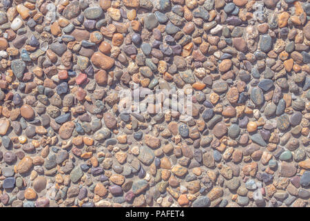 Textur auf einem Pfad aus Flusssteinen Stockfoto