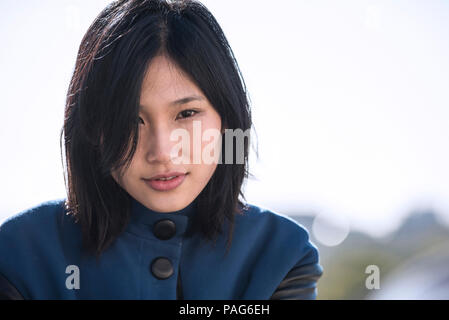 Junge Frau in Nahaufnahme Stockfoto