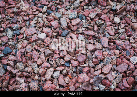 Hintergrund der farbigen Schutt auf dem Boden Stockfoto