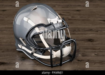 American football Helm auf dem Holztisch, 3D-Rendering Stockfoto