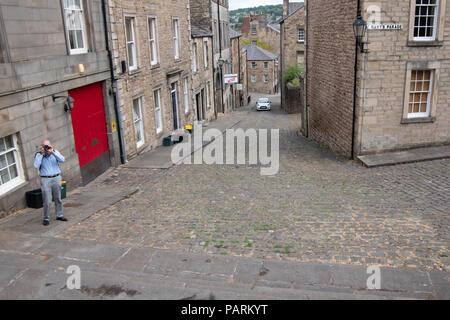 Fotografen, Bild in Richtung Kamera an der Kreuzung Church Street und St. Mary's Parade, Lancaster, Stadtzentrum, Lancashire, Großbritannien Stockfoto