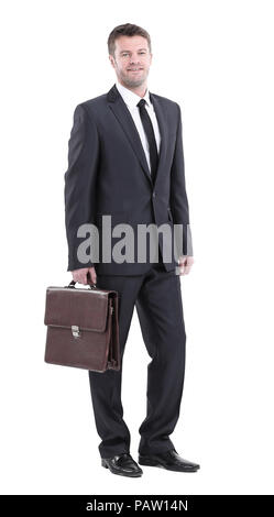 Die ganze Länge der Junge erfolgreiche Manager lächelnd auf Weiß isoliert Stockfoto