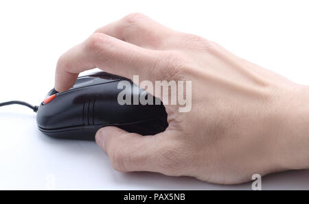 Hand auf eine Maus auf einem weißen Tisch Stockfoto