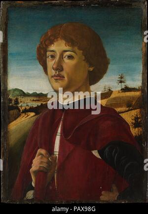 Porträt eines jungen Mannes. Artist: Biagio d'Antonio (italienisch, Florentiner, aktiv von 1472 - gestorben 1516). Abmessungen: Insgesamt 21 3/8 x 15 1/2 in. (54,3 x 39,4 cm); Oberfläche lackiert 20 1/4 x 14 1/4 in. (51,4 x 36,2 cm). Datum: Ca. 1470. Dies ist Biagio d'Antonio's vornehmsten Porträt, und wurde um 1470 gemalt. Ihre skulpturale Qualität ist zu Dank verpflichtet, die Bildhauer und Maler Verrocchio, der einen tiefen Einfluss auf Künstler der Biagio Generation hatte. Im Hintergrund Biagio zeigt das Tal des Arno Flusses mit der Stadtmauer und den Dom von Florenz. Museum: Metropolitan Museum von Ar Stockfoto