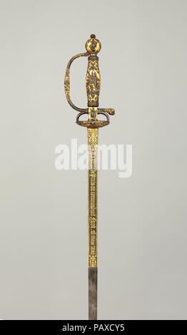 Smallsword Präsentiert von der Stadt Paris zu Kommandant Ildefonse Favé (1812-1894). Kultur: Französisch. Abmessungen: L 36. (91,5 cm); L. der Klinge 30 cm. (76,6 cm); W. 3 1/4 in. (8,3 cm); Wt. 1 lb. 0,6 oz. (470.6 g). Griff Teekocher: Paul Bled (Französisch, Falaise 1807-1881). Hersteller: Lepage-Moutier (Französisch 1842-1868). Datum: datiert 1856. Diese smallsword wurde von der Stadt Paris zu Kommandant Ildefonse Favé präsentiert seine offizielle Ankündigung in der Stadt der Geburt von Napoléon, kaiserliche Prinz (1856-1879), Sohn von Kaiser Napoleon III. am 16. März 1856 zu gedenken, wie von der Inscr angezeigt Stockfoto