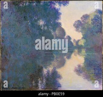 Morgen auf der Seine in der Nähe von Giverny. Künstler: Claude Monet (Französisch, Paris 1840-1926 Giverny). Abmessungen: 32 1/8 x 36 5/8 in. (81,6 x 93 cm). Datum: 1897. Im Jahre 1896 begonnen, Monet's Morgen auf der Seine Serie wurde erst 1897 aufgrund von schlechtem Wetter abgeschlossen. Geduldig, kundschaftete Blick entlang des Flusses, Monet malte die Bilder dann von einem Boot aus, dass er in ein schwimmendes Studio umgewandelt hatte. Für einen längeren Zeitraum stieg er von Dawn, um auf die sich verändernden Wirkungen von Licht malen wie die Sonne kam. Er richtete die Leinwände auf Staffeleien in seinem Studio, um sie zusammen zu Als ser abgeschlossen Stockfoto