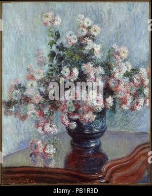 Chrysanthemen. Künstler: Claude Monet (Französisch, Paris 1840-1926 Giverny). Abmessungen: 39 1/2 x 32 1/4 in. (100,3 x 81,9 cm). Datum: 1882. Ein begeisterter Gärtner, Monet produziert etwa zwanzig blumen stillleben zwischen 1878 und 1883, sowohl kritische als auch kommerziellen Erfolg. Dieses Gemälde wurde gemeinsam mit dem Museum <i> Blumenstrauß aus Sonnenblumen</i> (29.100.107) in der Galerie Camille 1883 in Paris und wieder mit dem Künstler der Avantgarde' Circle Les XX in Brüssel im Jahre 1886 ausgestellt. Museum: Metropolitan Museum of Art, New York, USA. Stockfoto