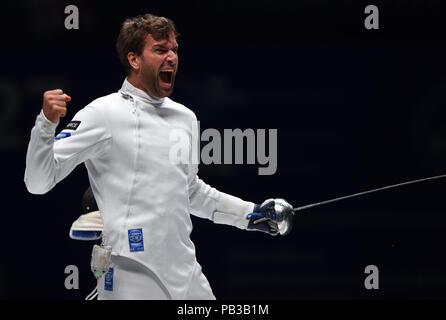 Wuxi in der chinesischen Provinz Jiangsu. 26. Juli, 2018. Benjamin Steffen der Schweiz feiert Sieg nach der Mannschaft Männer epee Finale gegen Südkorea an die Fecht-WM in Wuxi, Osten Chinas in der Provinz Jiangsu, 26. Juli 2018. Die Schweiz gewann 36-31. Credit: Han Yuqing/Xinhua/Alamy leben Nachrichten Stockfoto